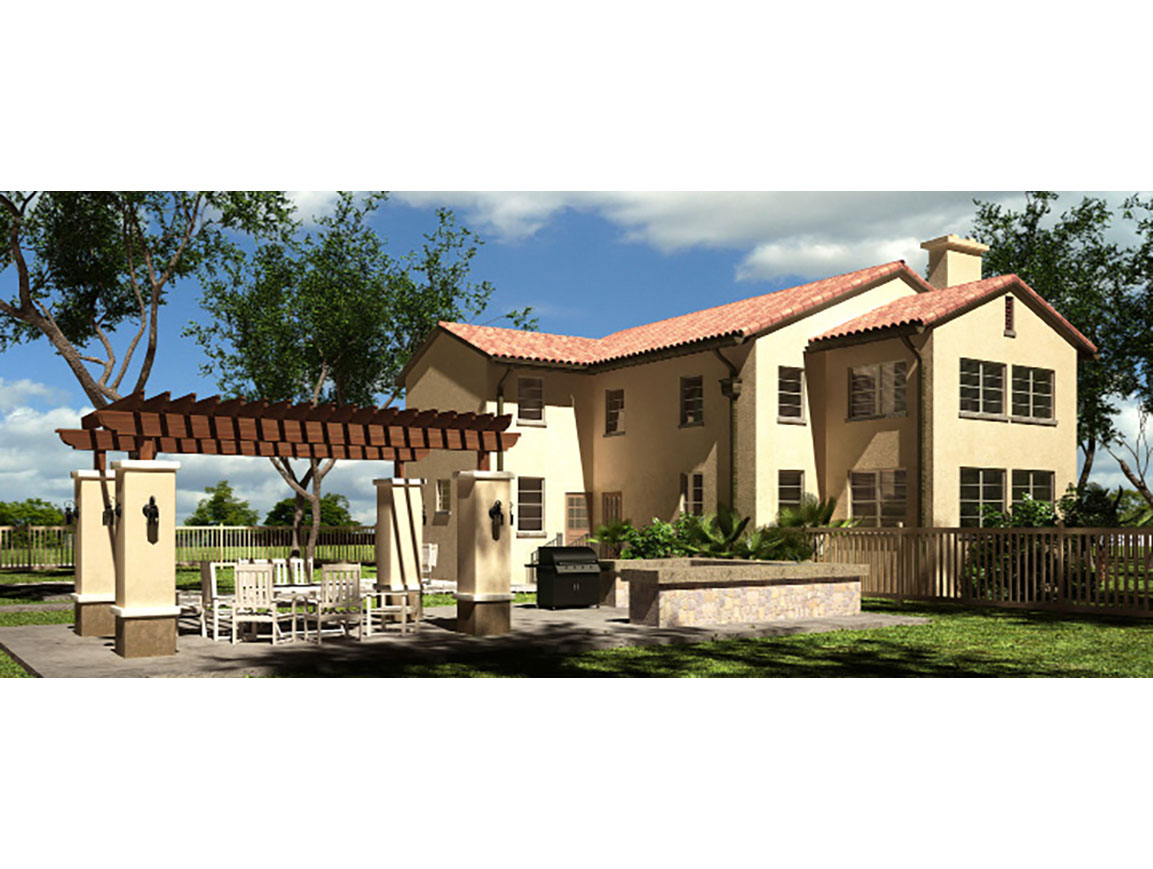 Outdoor kitchen and patio area of a historic home.